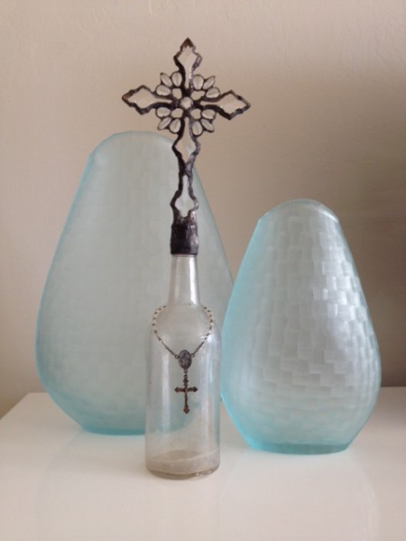 rosary around bottle