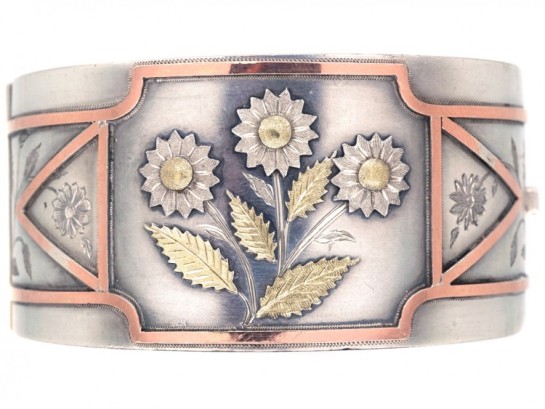 victorian silver and gold overlay bangle with sunflowers via the antique jewellery company